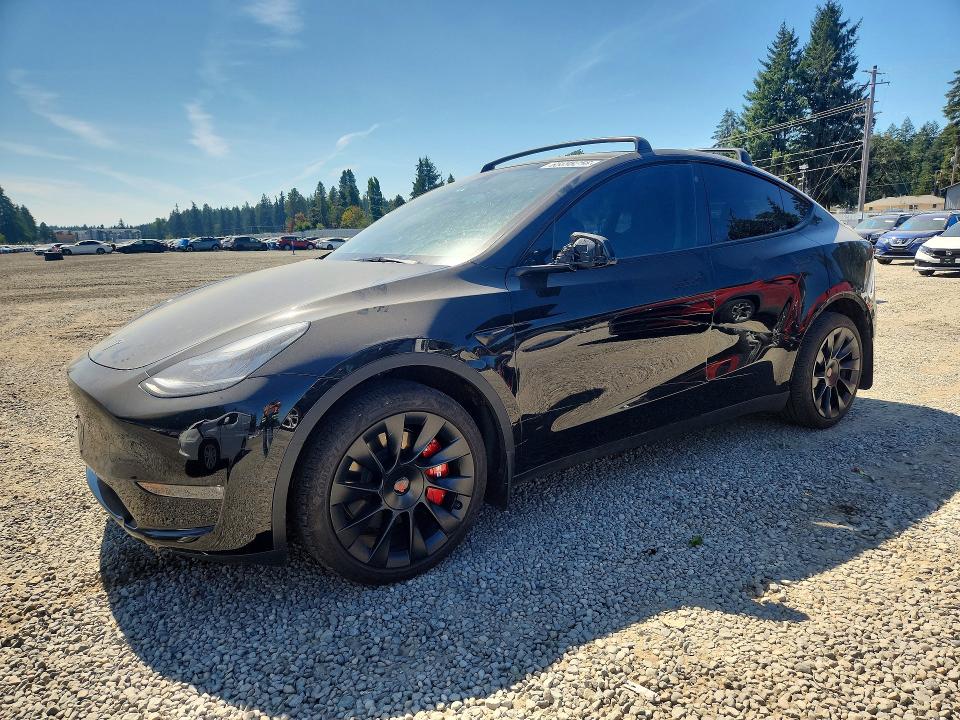 2023 Tesla Model y VIN 7SAYGDEE0PA105031 COPART salvage auction — REAR END, WA - BILL OF SALE, sold $15,700 on 2026-08-28 (photo 1)