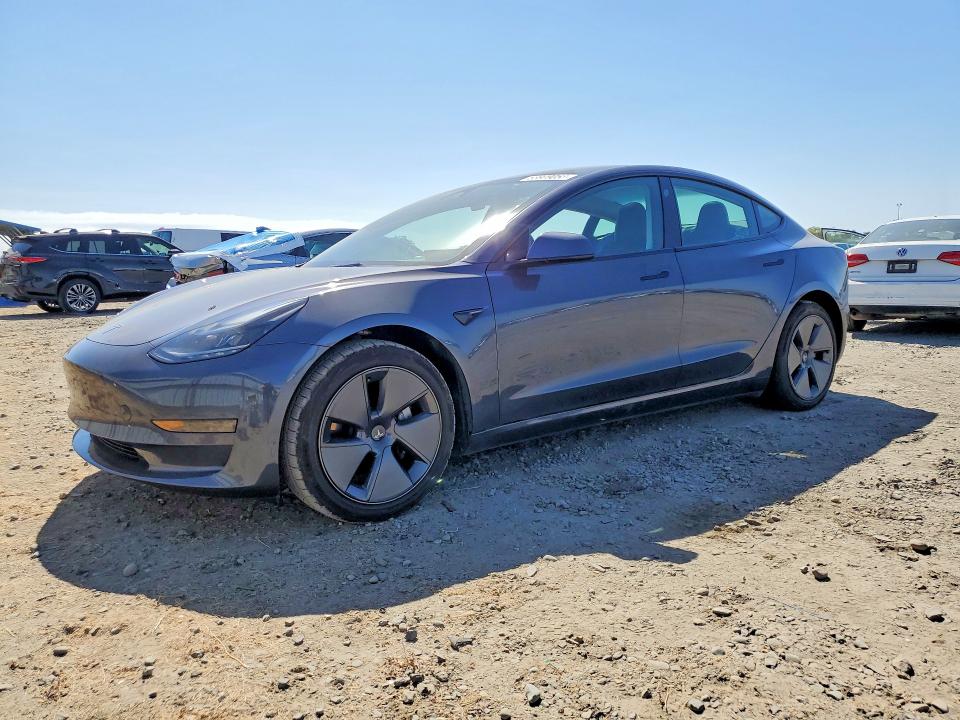 2023 Tesla Model 3 VIN 5YJ3E1EA5PF424873 — COPART salvage auction photo