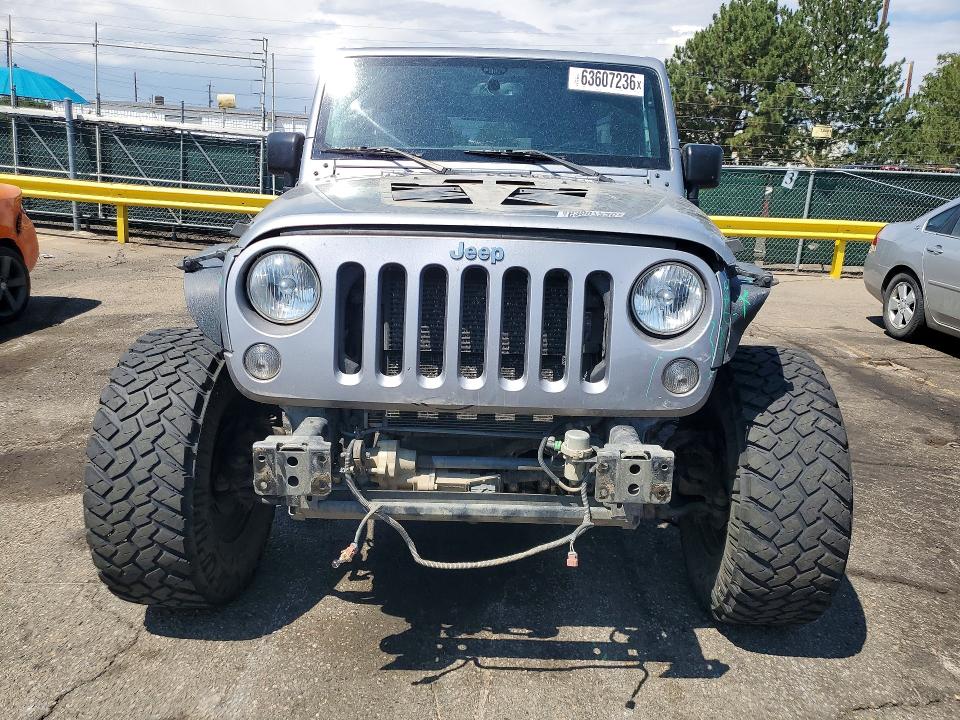 2015 Jeep Wrangler unlimited VIN 1C4BJWFG1FL655076 COPART salvage auction — FRONT END, Co - Public - Salvage Title, sold $8,400 on 2026-09-29 (photo 5)