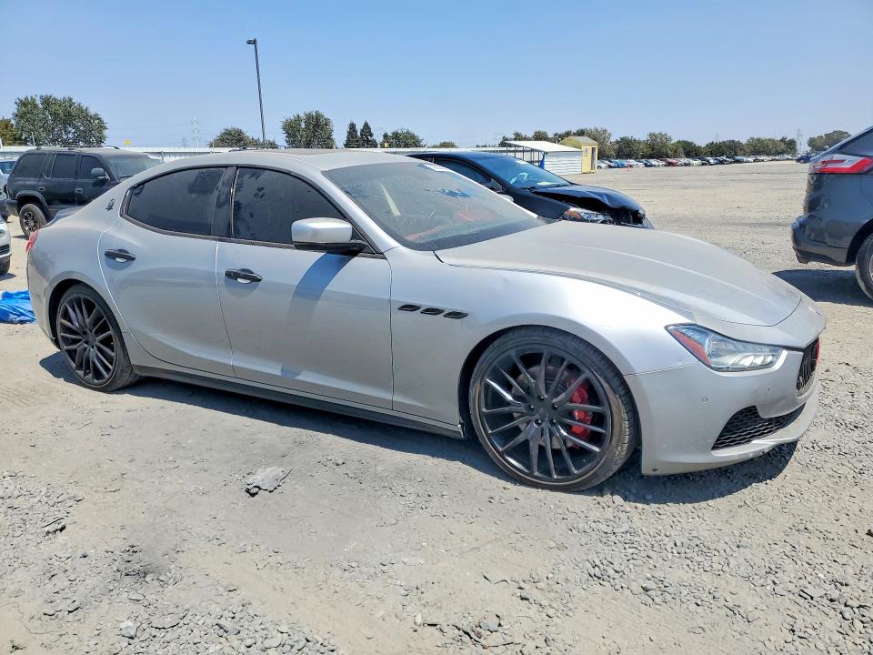 2015 Maserati Ghibli VIN ZAM57RTA3F1153450 COPART salvage auction — NORMAL WEAR, Nv - Dis/Dlr/Exp Only Clean Title (P), sold $950 on 2026-08-11 (photo 4)