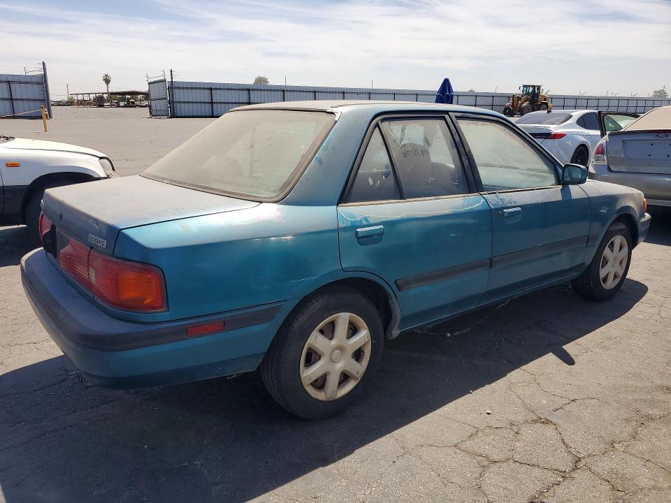 1994 Mazda Protege VIN JM1BG2264R0706581 COPART salvage auction — REAR END, CA - DIS/DLR/EXP APP FOR DUP CLEAN, sold $60 on 2026-09-03 (photo 3)