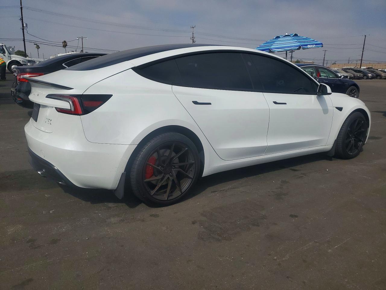 2026 Tesla Model 3 VIN 5YJ3E1ETXTF156382 COPART salvage auction — Side, CA - SALVAGE CERTIFICATE, sold $22,400 on 2026-09-23 (photo 3)