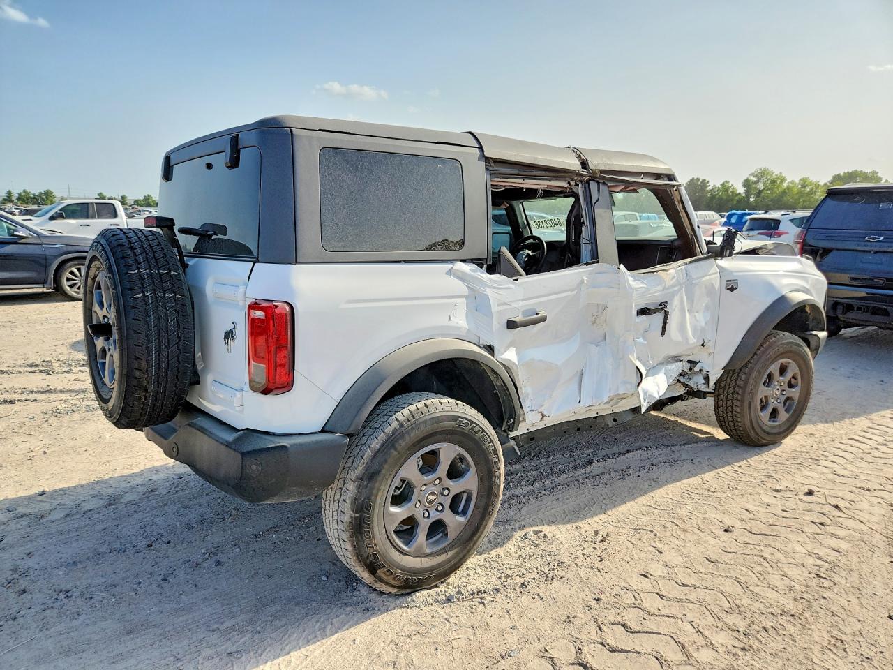 2024 Ford Bronco VIN 1FMDE7BH5RLB43208 COPART salvage auction — Frame Damage, TX - SALVAGE VEHICLE TITLE, sold $10,000 on 2026-09-08 (photo 3)