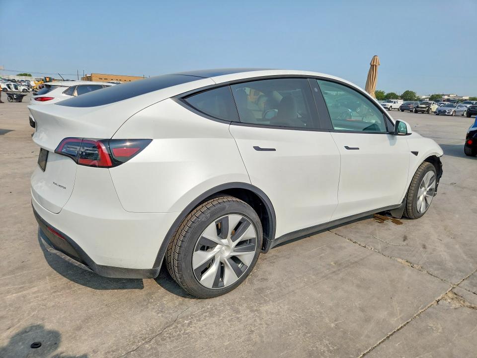 2023 Tesla Model y VIN 7SAYGDEEXPF780999 COPART salvage auction — FRONT END, Tx - Certificate Of Title, sold $5,000 on 2026-09-08 (photo 3)
