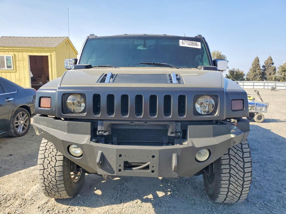 2005 Hummer H2 VIN 5GRGN23U25H104734 COPART salvage auction — SIDE, CA - DLR/DIS/EXP ONLY SALVAGE TITLE, sold $2,000 on 2026-09-10 (photo 5)