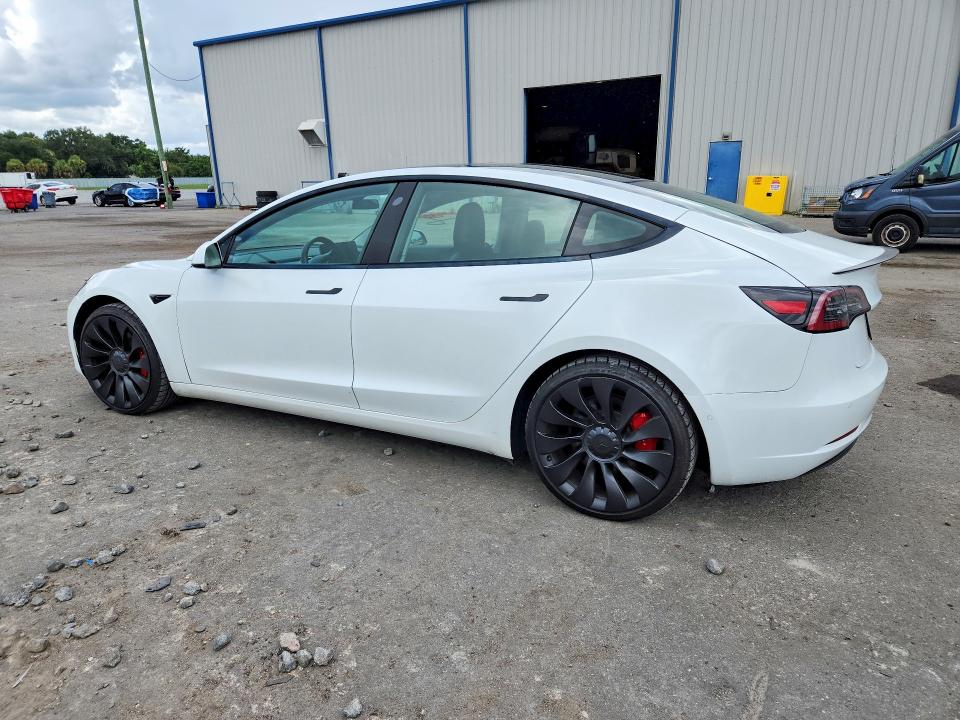 2021 Tesla Model 3 VIN 5YJ3E1EC2MF926480 COPART salvage auction — MINOR DENT/SCRATCHES, Fl - Cert Of Title-Rebuilt, sold $10,000 on 2026-08-28 (photo 2)