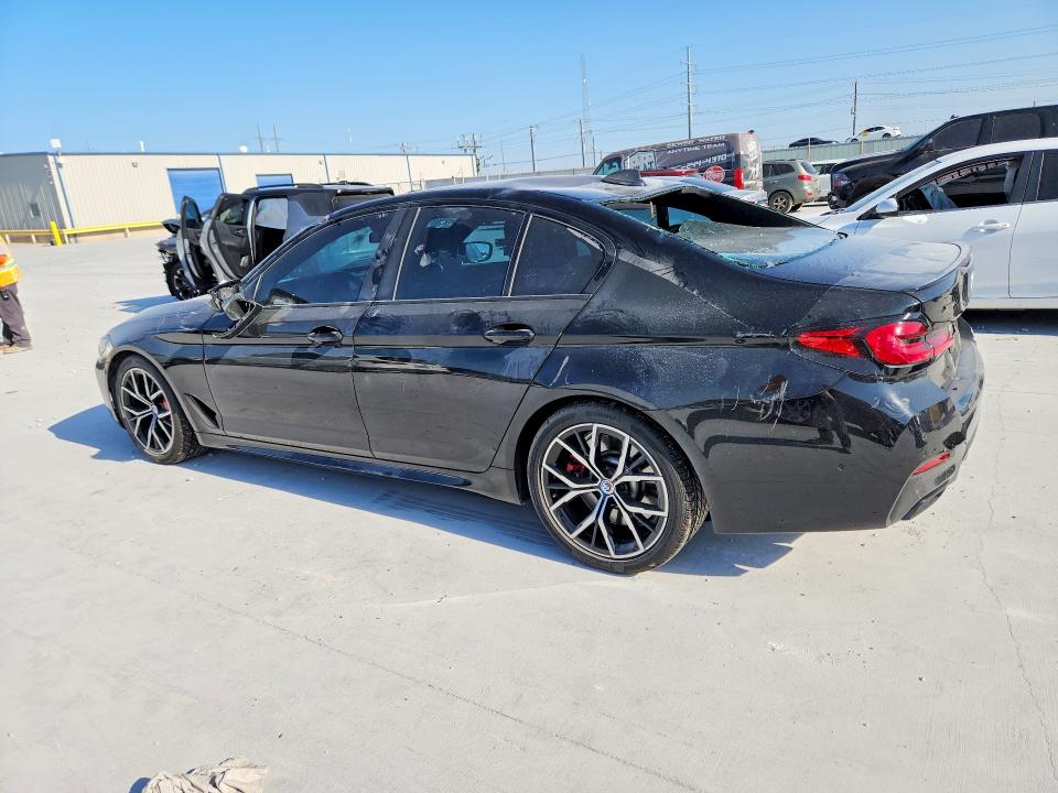 2023 BMW M5 VIN WBA13BK00PCM19766 COPART salvage auction — ROOF, Tx - Certificate Of Title, sold $25,250 on 2026-10-06 (photo 2)