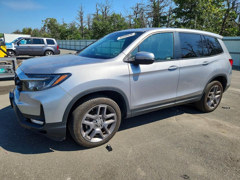 2023 Honda Passport VIN 5FNYF8H53PB040956 — COPART salvage auction photo