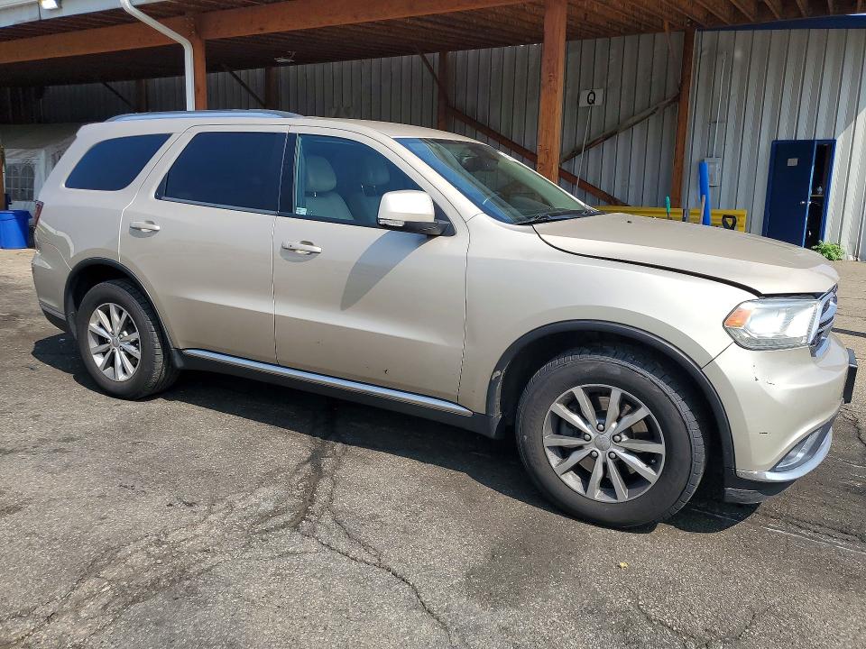 2014 Dodge Durango VIN 1C4SDJDTXEC345274 COPART salvage auction — MECHANICAL, Co - Dis/Dlr/Exp Only Clean Title, sold $1,400 on 2026-09-29 (photo 4)