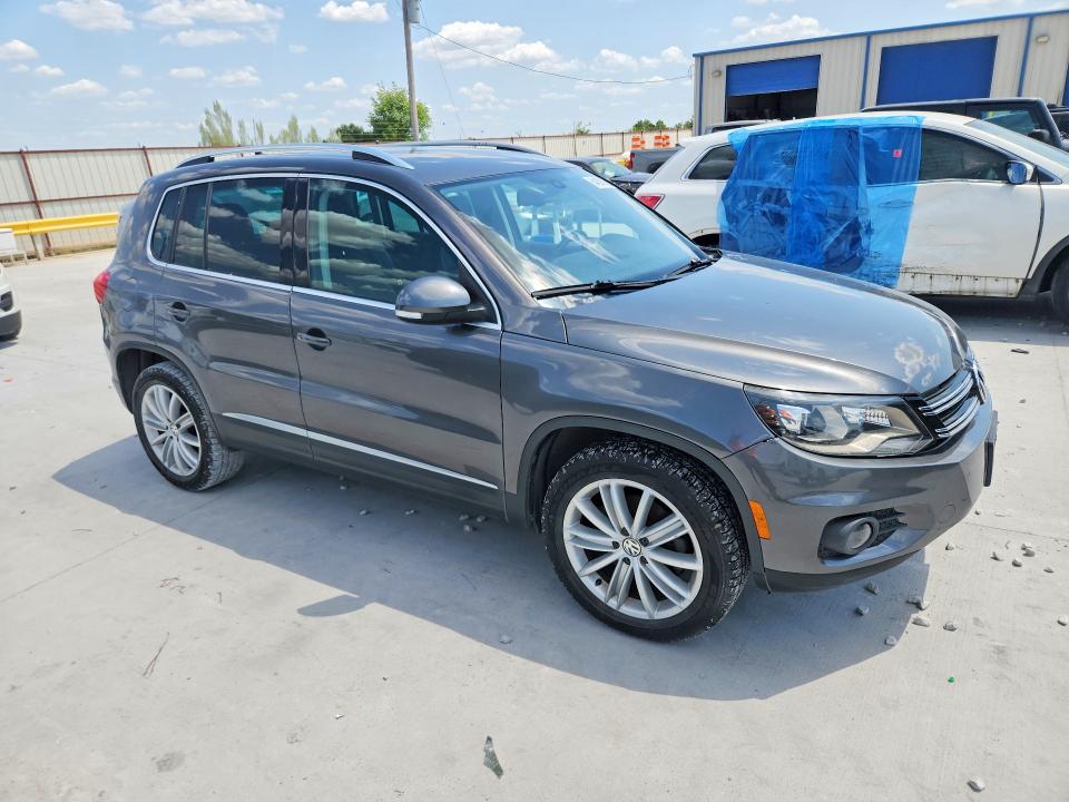 2016 Volkswagen Tiguan VIN WVGAV7AX2GW523209 COPART salvage auction — MINOR DENT/SCRATCHES, Tx - Certificate Of Title, sold $2,050 on 2026-08-14 (photo 4)