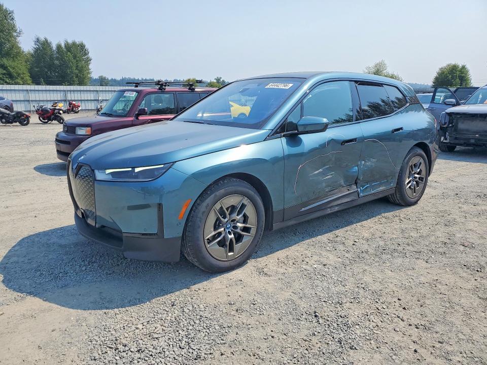 2023 BMW Ix VIN WB523CF06PCL19822 COPART salvage auction — SIDE, WA, sold $28,500 on 2026-10-12 (photo 1)