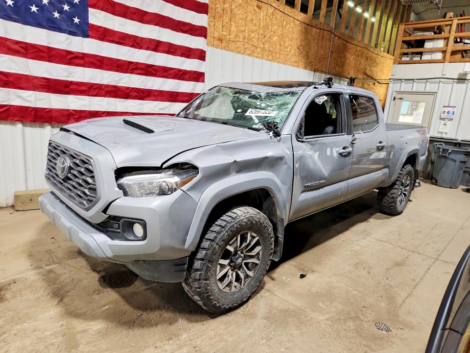 2021 Toyota Tacoma VIN 5TFDZ5BNXMX067683 — COPART salvage auction photo