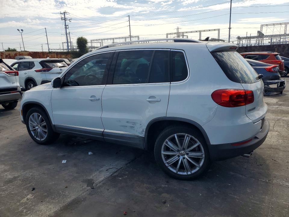2014 Volkswagen Tiguan VIN WVGAV3AX4EW560199 COPART salvage auction — SIDE, Ca - Salvage Certificate, sold $1,450 on 2026-08-19 (photo 2)