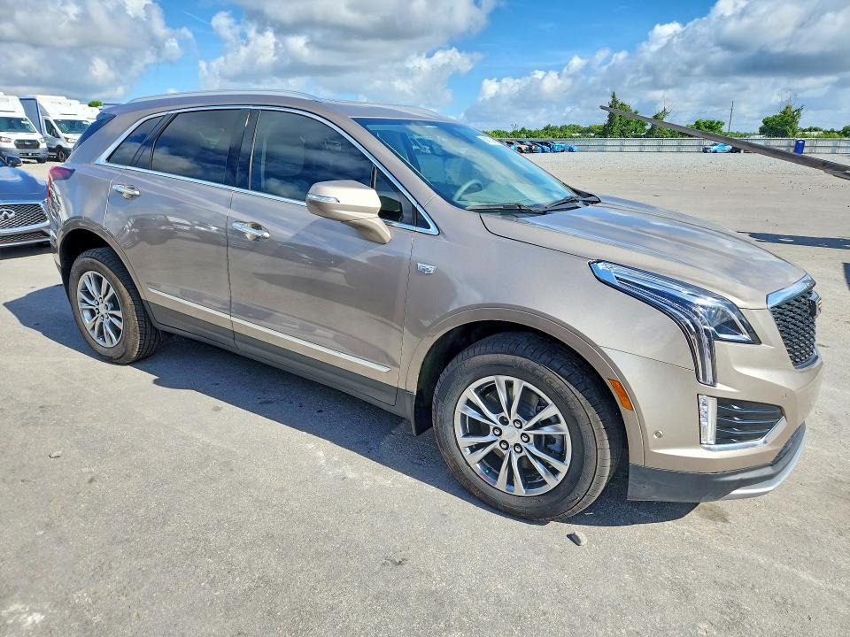 2022 Cadillac Xt5 VIN 1GYKNCRS6NZ164687 COPART salvage auction — WATER/FLOOD, FL - CERT OF TITLE-SLVG REBLD FLOOD (P), sold $3,450 on 2026-08-20 (photo 4)