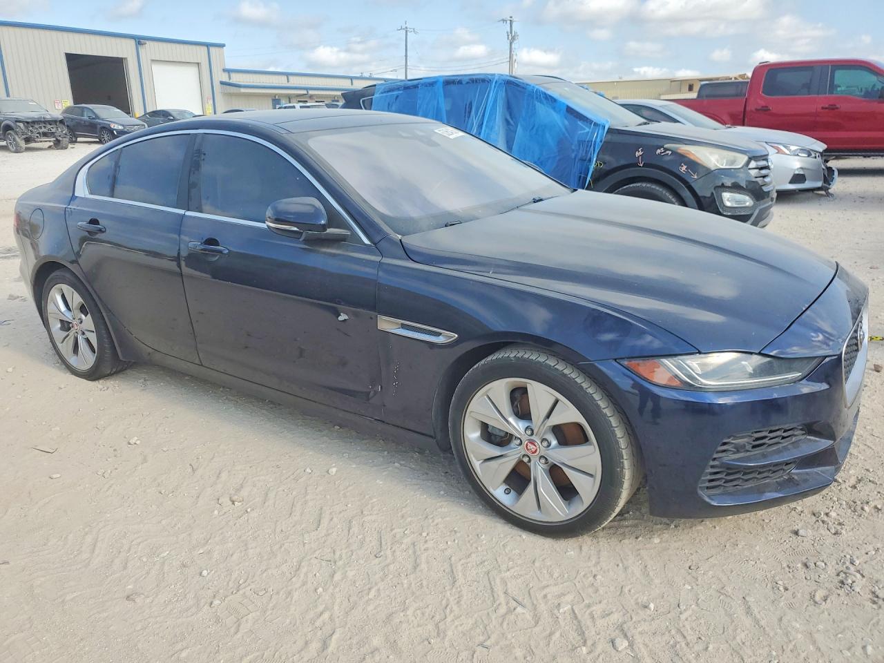 2020 Jaguar Xe VIN SAJAE4FX3LCP60249 COPART salvage auction — Side, TX - CERTIFICATE OF TITLE, sold $3,850 on 2026-09-03 (photo 4)