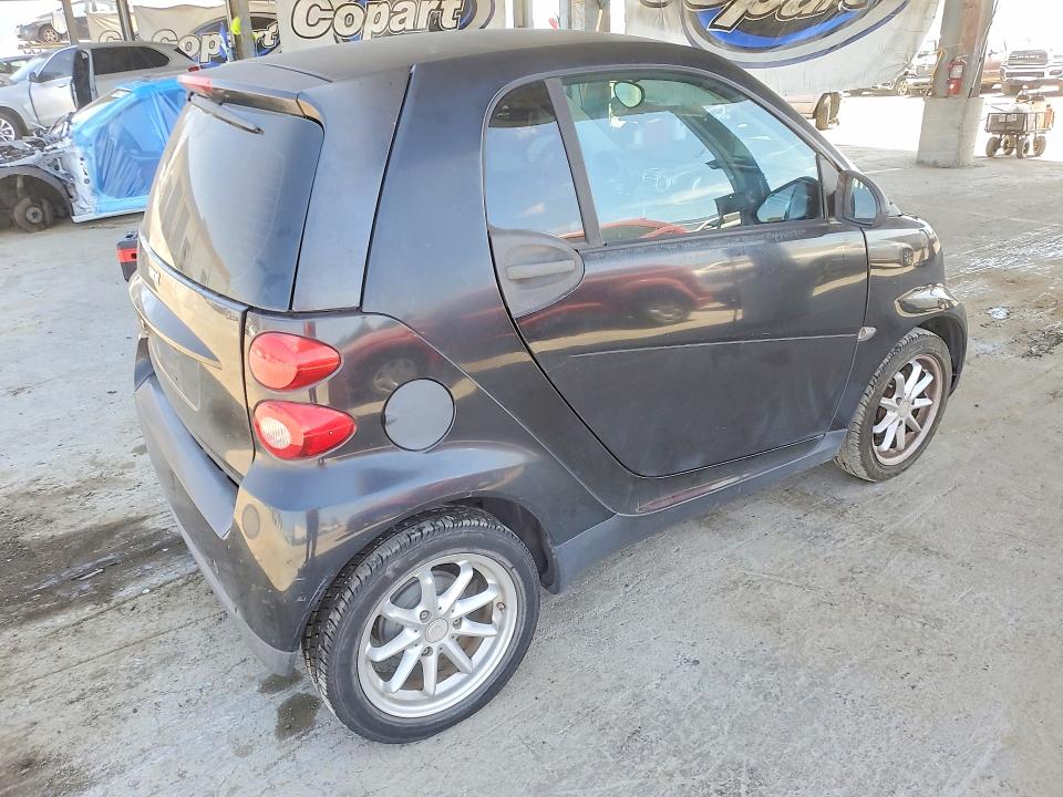 2009 Smart Fortwo VIN WMEEJ31X79K273021 COPART salvage auction — FRONT END, Ca - Dis/Dlr/Exp Only Clean Title, sold $300 on 2026-08-13 (photo 3)