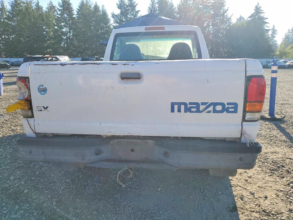 1999 Mazda VIN 4F4YR12C8XTM00362 COPART salvage auction — REAR END, Wa - Vehicle Cert Of Ownership-Titl, sold $725 on 2026-09-08 (photo 6)