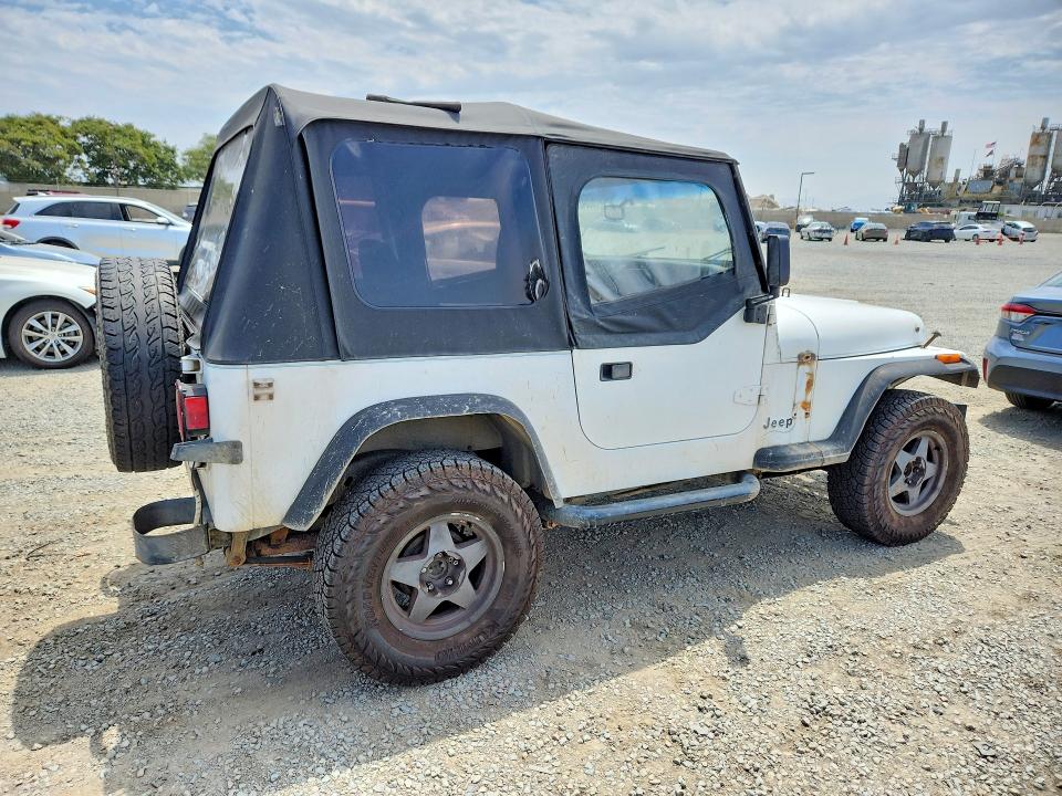 1993 Jeep Wrangler / VIN 1J4FY19P3PP219989 COPART salvage auction — FRONT END, CA - DIS/DLR/EXP ONLY CLEAN TITLE, sold $1,600 on 2026-08-21 (photo 3)