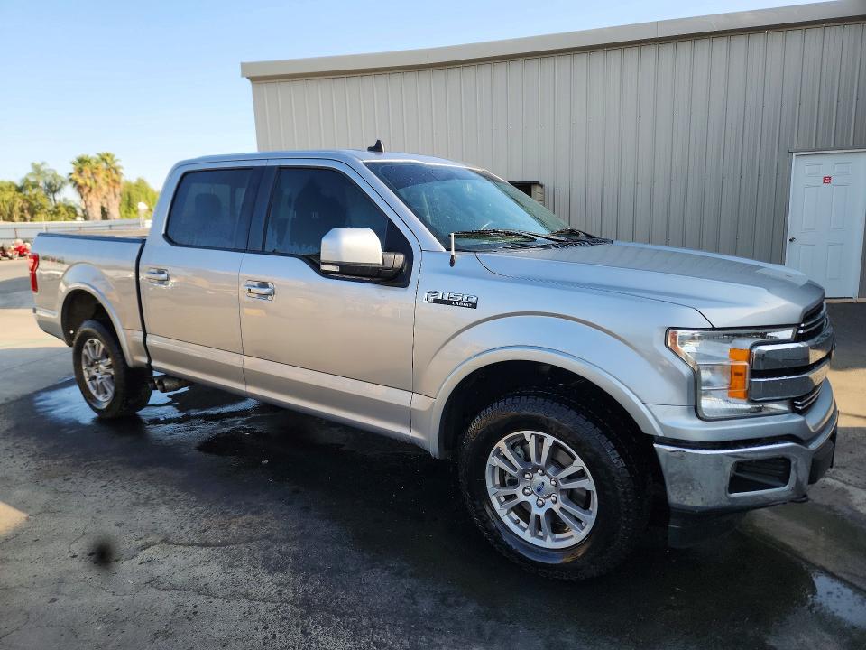 2020 Ford F-150 lightning VIN 1FTEW1E53LKD27774 COPART salvage auction — MINOR DENT/SCRATCHES, CA - CERTIFICATE OF TITLE, sold $12,900 on 2026-09-08 (photo 4)