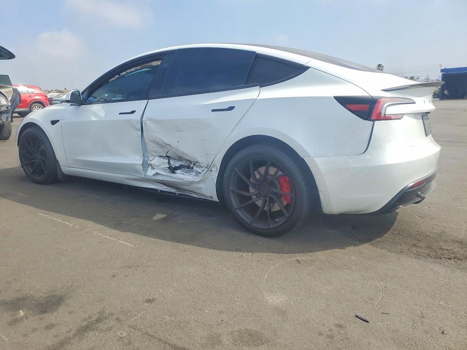 2026 Tesla Model 3 VIN 5YJ3E1ETXTF156382 COPART salvage auction — SIDE, CA - SALVAGE CERTIFICATE, sold $20,700 on 2026-09-21 (photo 2)