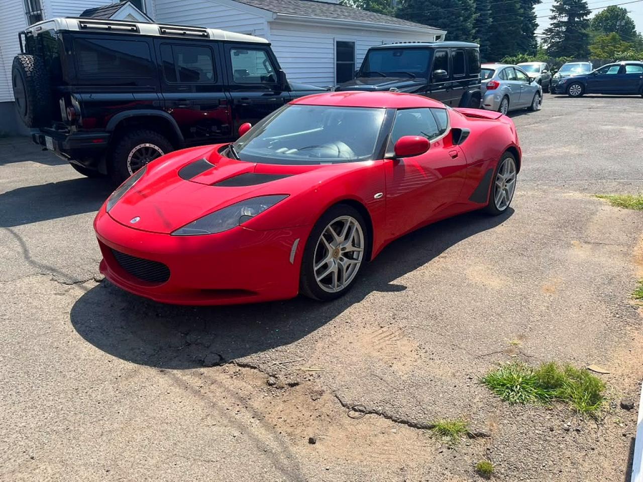 2011 Lotus Evora VIN SCCLMDTC3BHA10820 — COPART salvage auction photo