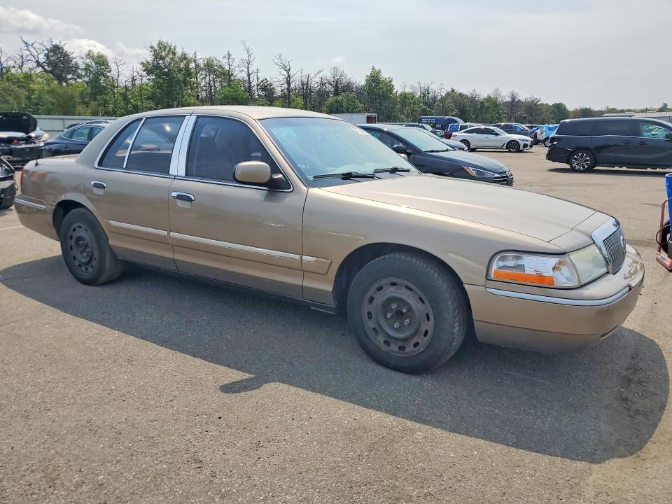 2005 Mercury Grand marquis VIN 2MEFM74W75X674868 COPART salvage auction — MINOR DENT/SCRATCHES, NY - CERTIFICATE OF TITLE, sold $625 on 2026-09-09 (photo 4)