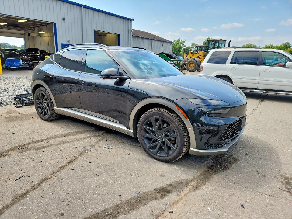 2023 Genesis Gv60 VIN KMUKCDTC2PU010476 COPART salvage auction — SIDE, MN - CERT OF TITLE-SALVAGE, sold $15,100 on 2026-10-20 (photo 4)