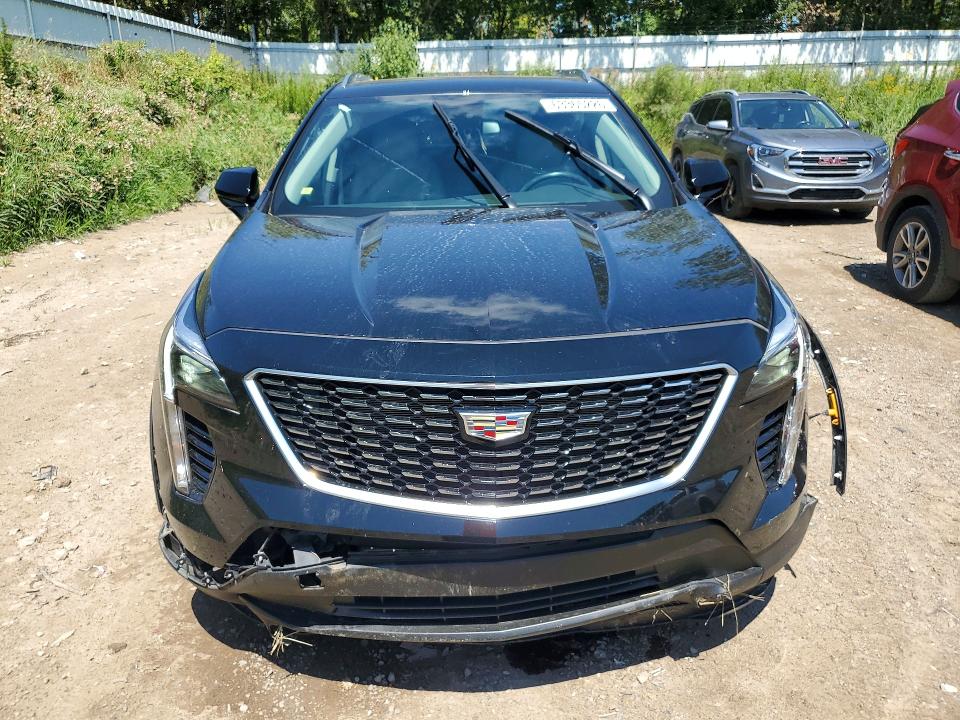 2021 Cadillac Xt4 VIN 1GYFZBR49MF083510 COPART salvage auction — FRONT END, Mi - Certificate Of Title, sold $9,700 on 2026-08-12 (photo 5)