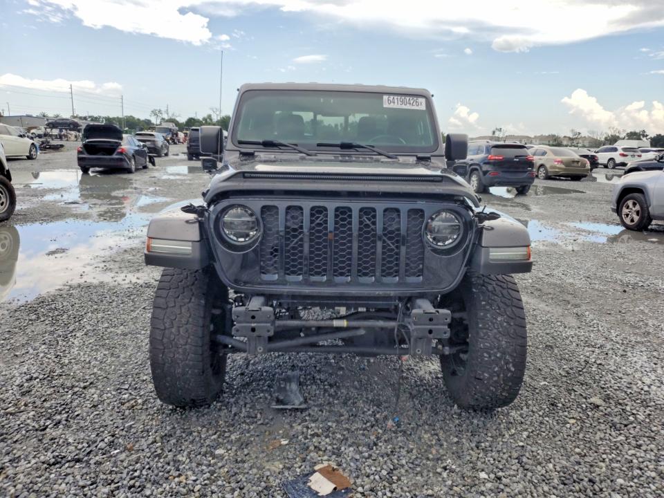 2021 Jeep Gladiator VIN 1C6HJTAG7ML552457 COPART salvage auction — WATER/FLOOD, Fl - Cert Of Title-Slvg Rebld Flood, sold $9,000 on 2026-09-11 (photo 5)