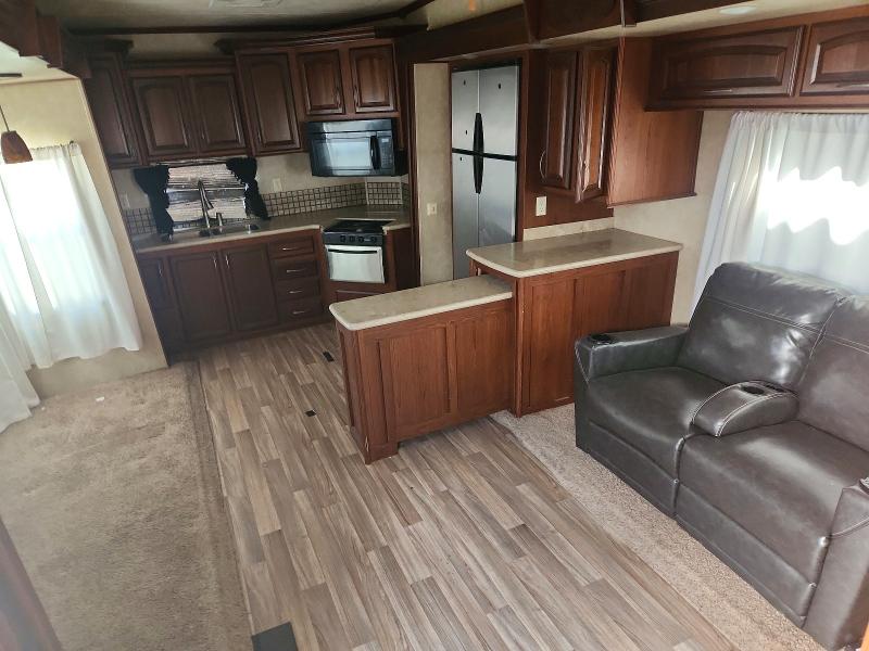 2014 Forest river M-340rk VIN 4X4FCMK21E6002216 COPART salvage auction — SIDE, TX - SALVAGE TITLE-FLOOD DAMAGE, sold $5,000 on 2026-09-15 (photo 6)