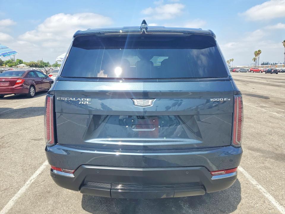 2026 Cadillac Escalade VIN 1GYLELKL6TU102577 COPART salvage auction — MINOR DENT/SCRATCHES, Mi - Dis/Dlr/Exp Only Clean Title (P), sold $101,000 on 2026-09-30 (photo 6)