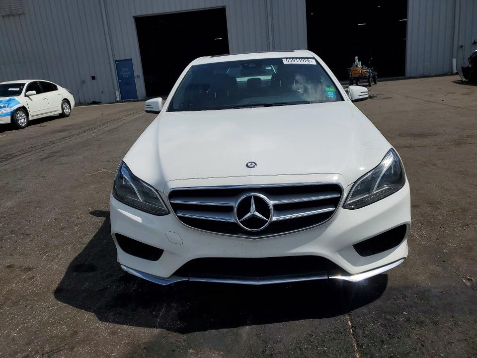 2014 Mercedes-benz E-class VIN WDDHF5KB4EB019195 COPART salvage auction — NORMAL WEAR, FL - CERTIFICATE OF TITLE, sold $2,150 on 2026-08-17 (photo 5)