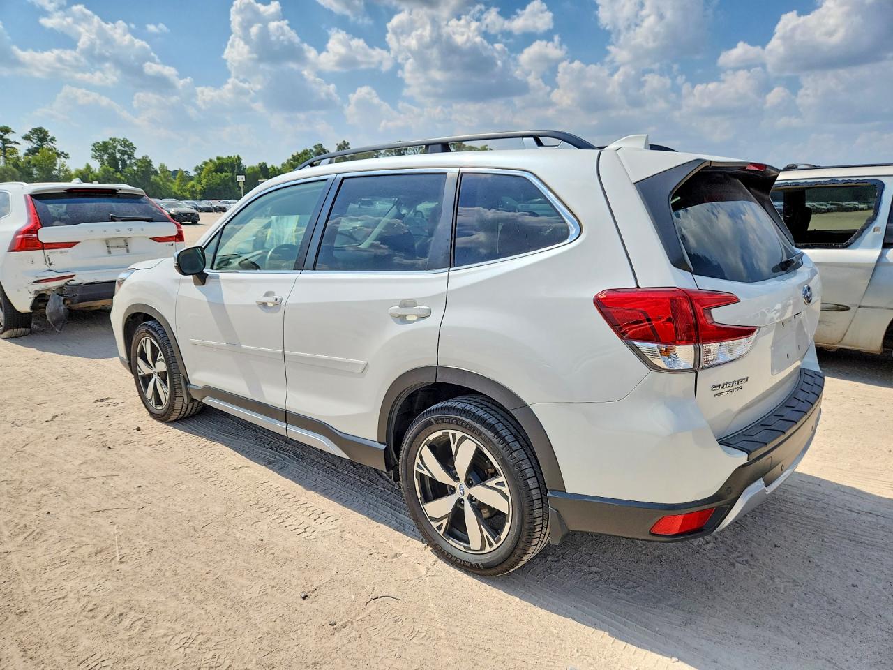 2021 Subaru Forester VIN JF2SKAXC7MH546697 COPART salvage auction — Side, TX - SALVAGE VEHICLE TITLE, sold $9,400 on 2026-09-04 (photo 2)