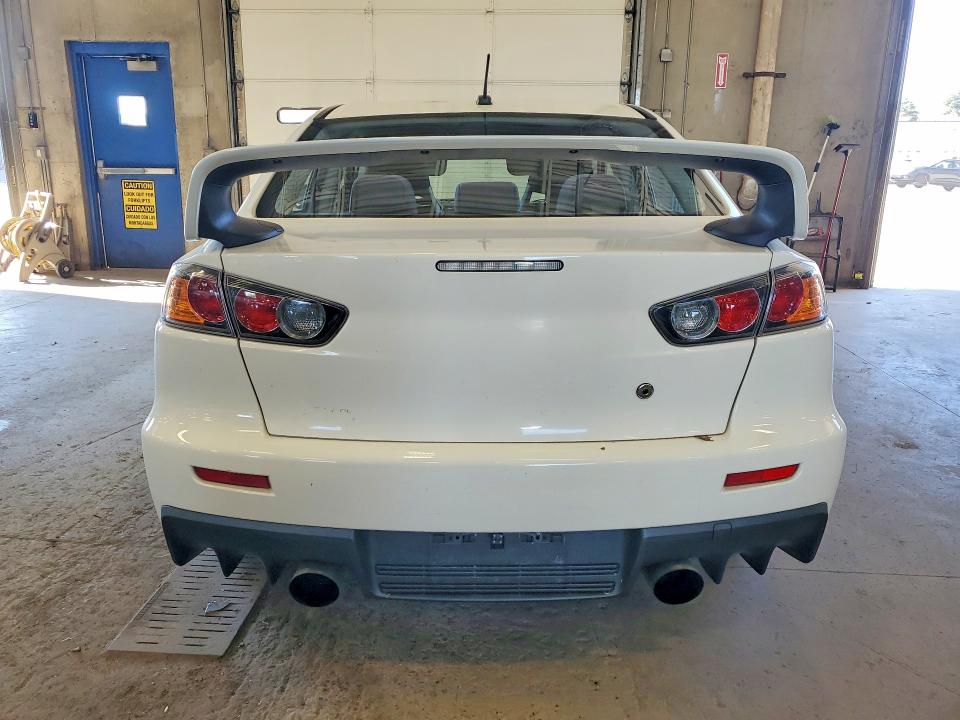 2010 Mitsubishi Lancer evolution VIN JA32W8FV8AU007926 COPART salvage auction — FRONT END, MN - CERT OF TITLE-PRIOR SALVAGE, sold $10,800 on 2026-09-01 (photo 6)