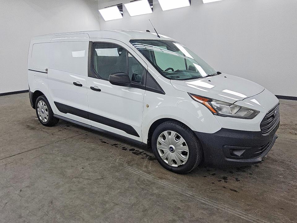 2021 Ford Transit connect VIN NM0LS7E22M1497432 COPART salvage auction — MINOR DENT/SCRATCHES, IL - CERTIFICATE OF TITLE, sold $11,100 on 2026-08-25 (photo 4)
