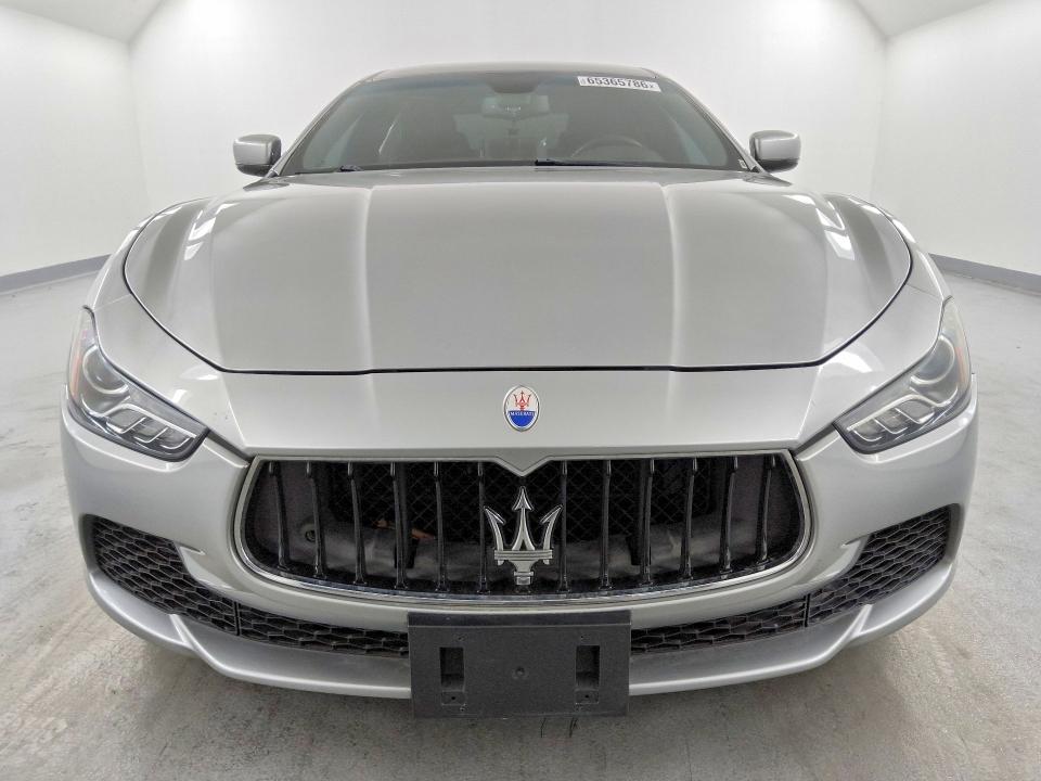 2014 Maserati Ghibli VIN ZAM57XSA5E1091487 COPART salvage auction — MINOR DENT/SCRATCHES, Ca - Dis/Dlr/Exp Only Clean Title, sold $3,800 on 2026-09-03 (photo 5)