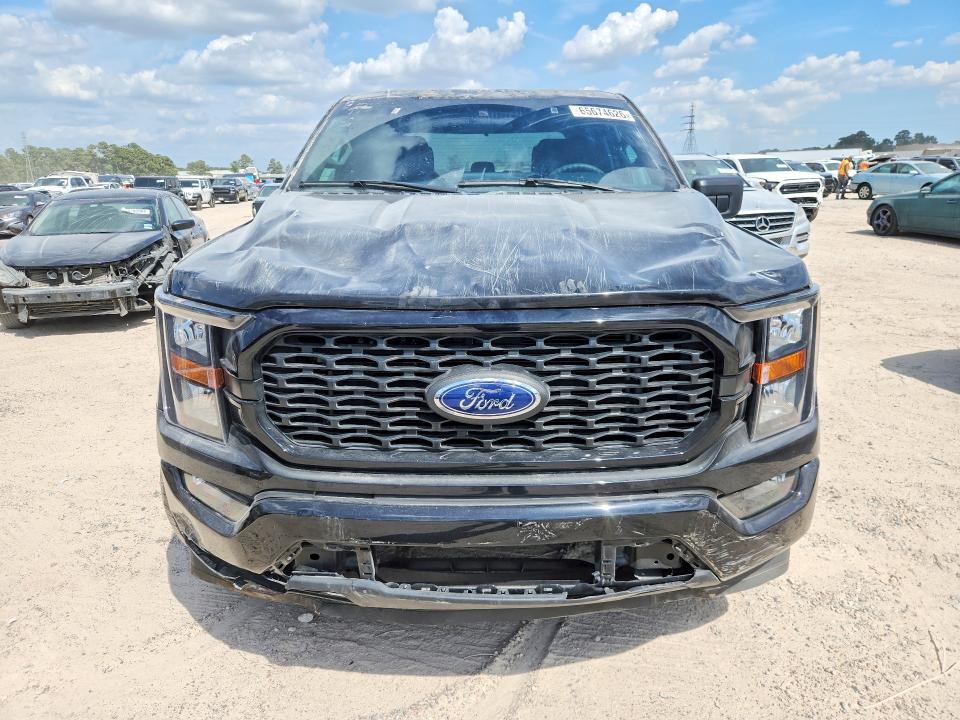 2023 Ford F-150 lightning VIN 1FTEW1C52PKF38909 COPART salvage auction — SIDE, TX - SALVAGE VEHICLE TITLE, sold $13,100 on 2026-08-21 (photo 5)