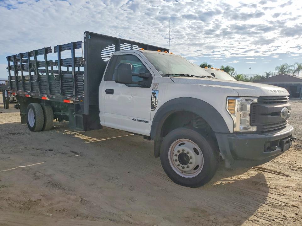 2018 Ford F550 VIN 1FDUF5GT7JEB31181 COPART salvage auction — MINOR DENT/SCRATCHES, IN - DIS/DLR/EXP ONLY CLEAN TITLE, sold $15,000 on 2026-09-01 (photo 4)