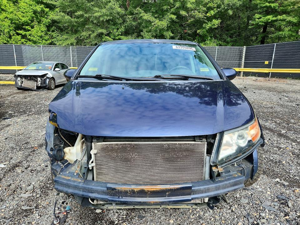 2014 Honda Odyssey VIN 5FNRL5H41EB077634 COPART salvage auction — FRONT END, MD - CERT OF SALVAGE > 75% DAMAGE, sold $225 on 2026-09-04 (photo 5)