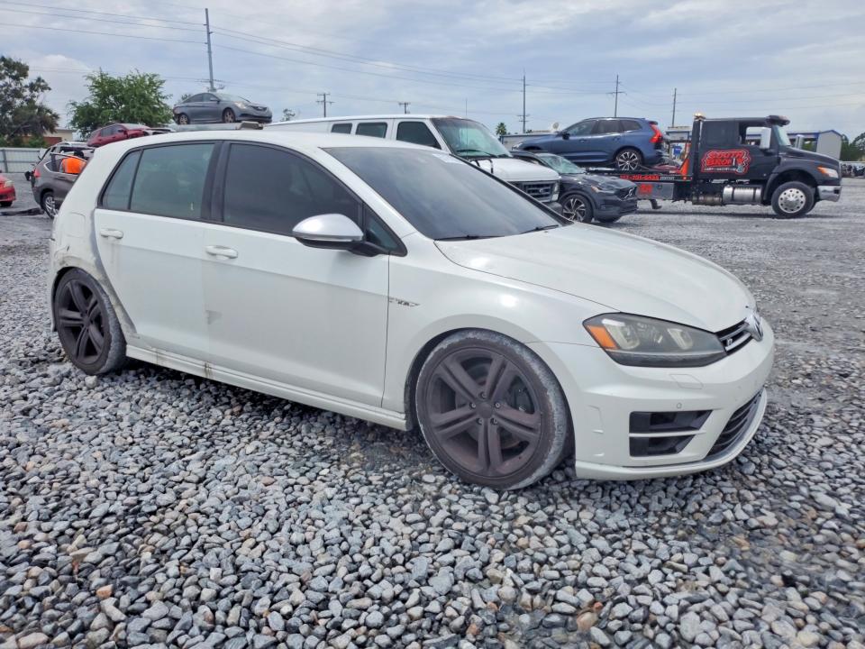 2016 Volkswagen Golf r VIN WVWUF7AU0GW239050 COPART salvage auction — SIDE, Fl - Cert Of Title Slvg Rebuildable (P), sold $8,500 on 2026-08-11 (photo 4)
