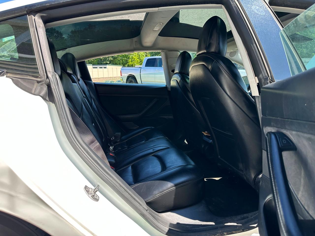 2021 Tesla Model 3 VIN 5YJ3E1EA9MF857852 COPART salvage auction — Rear End, VA - CERTIFICATE OF TITLE, sold $8,300 on 2026-09-15 (photo 8)