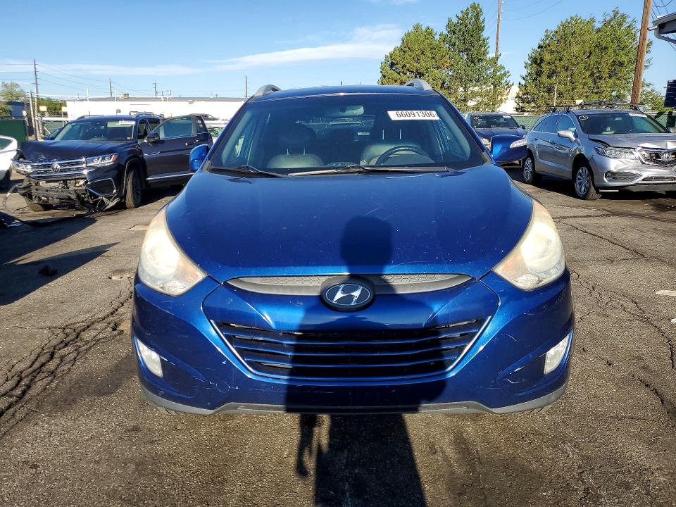 2013 Hyundai Tucson VIN KM8JU3AC0DU766565 COPART salvage auction — MINOR DENT/SCRATCHES, Co - Dis/Dlr/Exp Only Clean Title, sold $625 on 2026-09-08 (photo 5)
