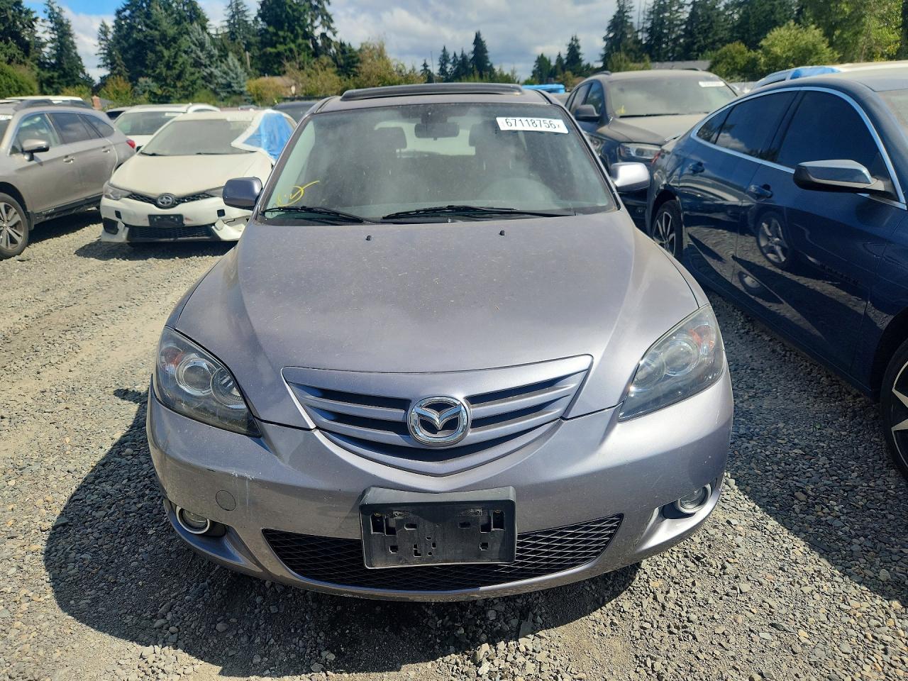 2006 Mazda 3 VIN JM1BK343961493043 COPART salvage auction — Front End, WA - VEHICLE CERT OF OWNERSHIP-TITL, sold $950 on 2026-09-09 (photo 5)