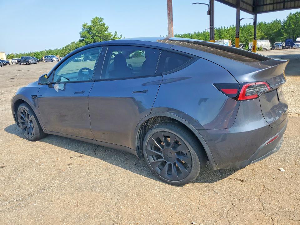 2023 Tesla Model y VIN 7SAYGDEE2PA027741 COPART salvage auction — SIDE, Nj - Certificate Of Title (P), sold $22,750 on 2026-09-22 (photo 2)