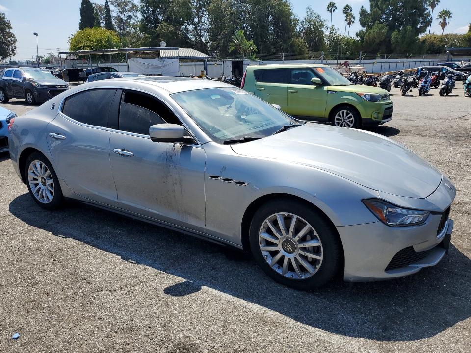 2014 Maserati Ghibli VIN ZAM57XSA5E1091487 COPART salvage auction — MINOR DENT/SCRATCHES, Ca - Dis/Dlr/Exp Only Clean Title, sold $2,950 on 2026-08-25 (photo 4)