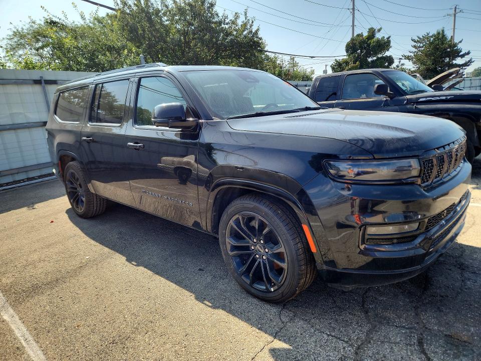2024 Jeep Grand wagoneer VIN 1C4SJSFPXRS139138 COPART salvage auction — NORMAL WEAR, Fl - Cert Of Title-Slvg Rebld Flood (P), sold $18,600 on 2026-09-01 (photo 4)