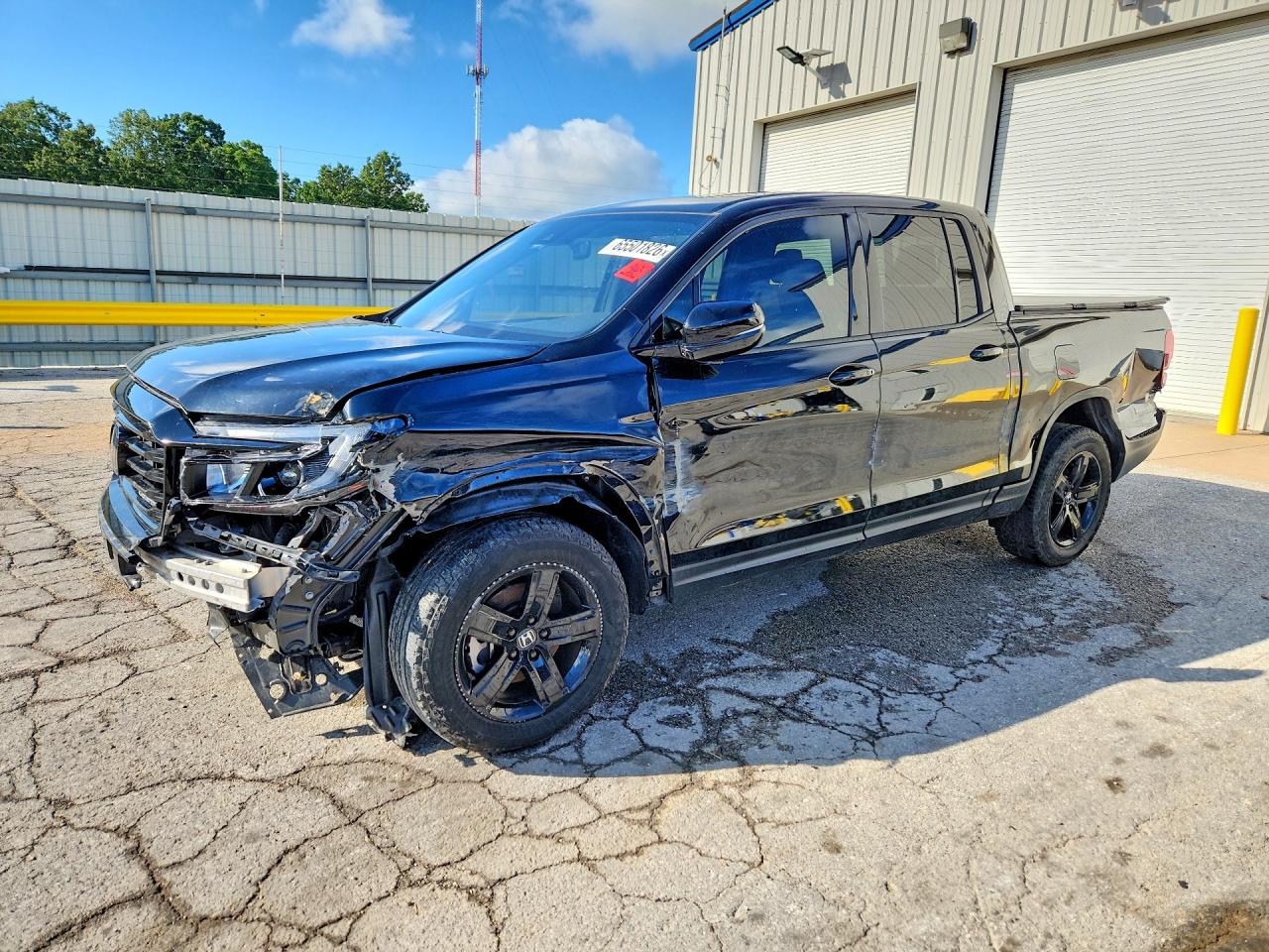 2023 Honda Ridgeline VIN 5FPYK3F89PB016213 — COPART salvage auction photo
