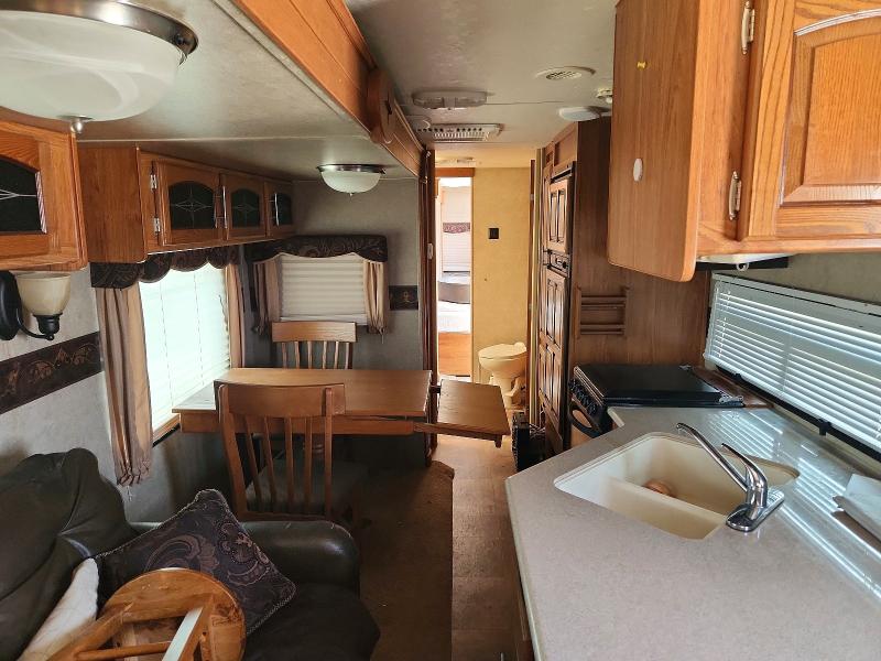 2013 Rockwood 8317ss VIN 4X4TRLG20D1846926 COPART salvage auction — VANDALISM, TX - SALVAGE VEHICLE TITLE, sold $3,000 on 2026-10-08 (photo 5)