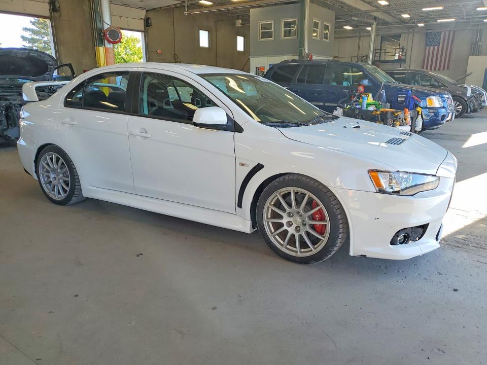 2010 Mitsubishi Lancer evolution VIN JA32W8FV8AU007926 COPART salvage auction — FRONT END, MN - CERT OF TITLE-PRIOR SALVAGE, sold $10,800 on 2026-09-01 (photo 4)