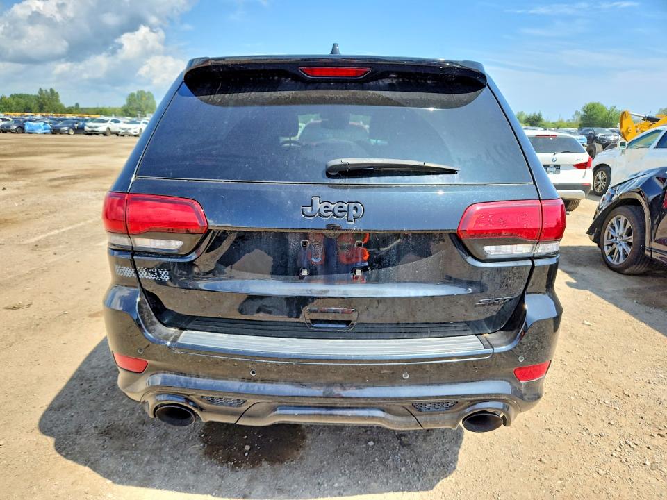 2020 Jeep Cherokee VIN 1C4RJFDJ2LC440587 COPART salvage auction — VANDALISM, On - Permit No Brand - Unfit, sold $30,250 on 2026-09-10 (photo 6)